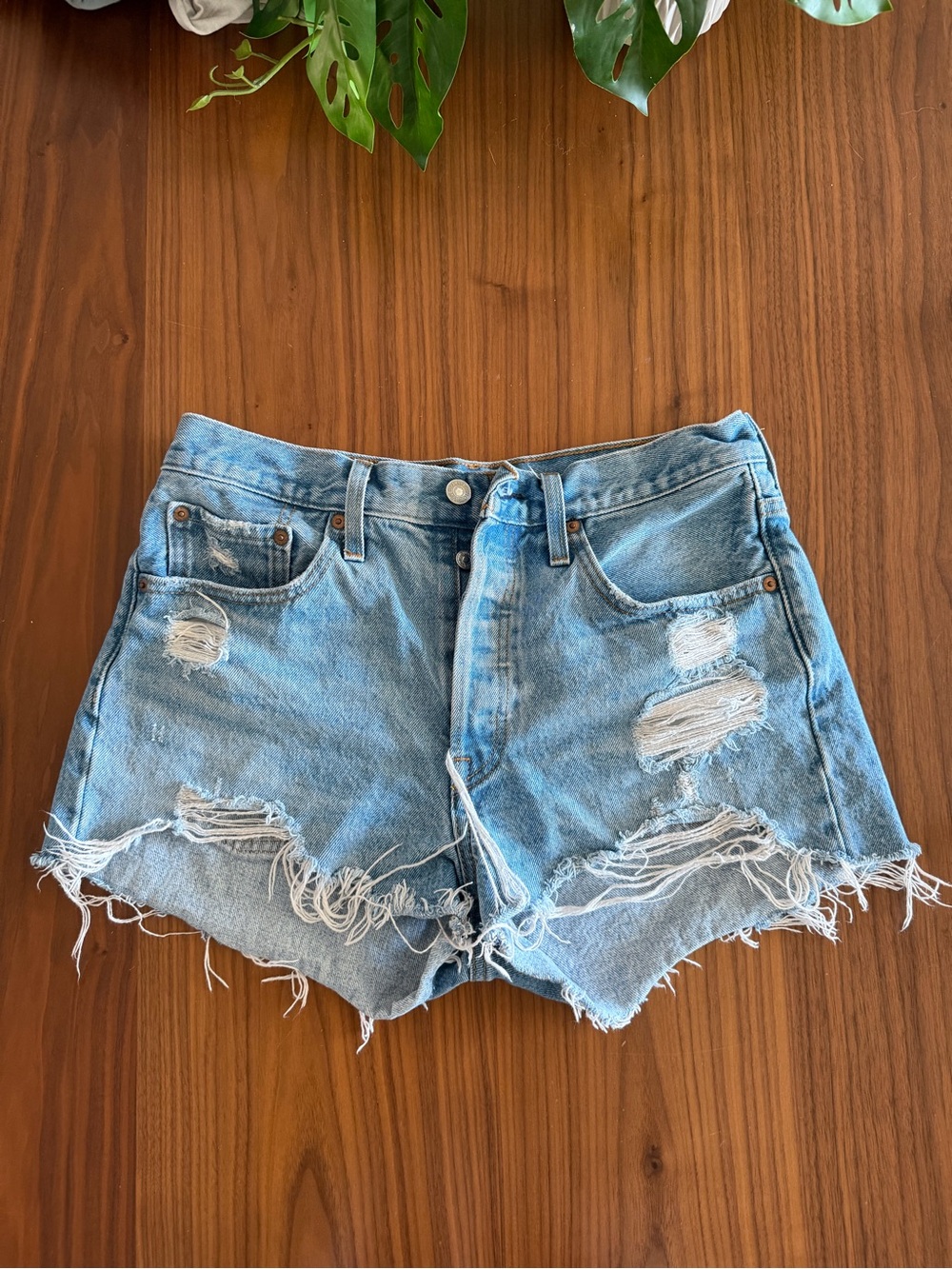 Levi’s Distressed Light Blue Denim Shorts